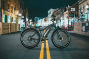 Used electric bike for sale in the UK at night — MyNextBike.co.uk marketplace for e-bikes