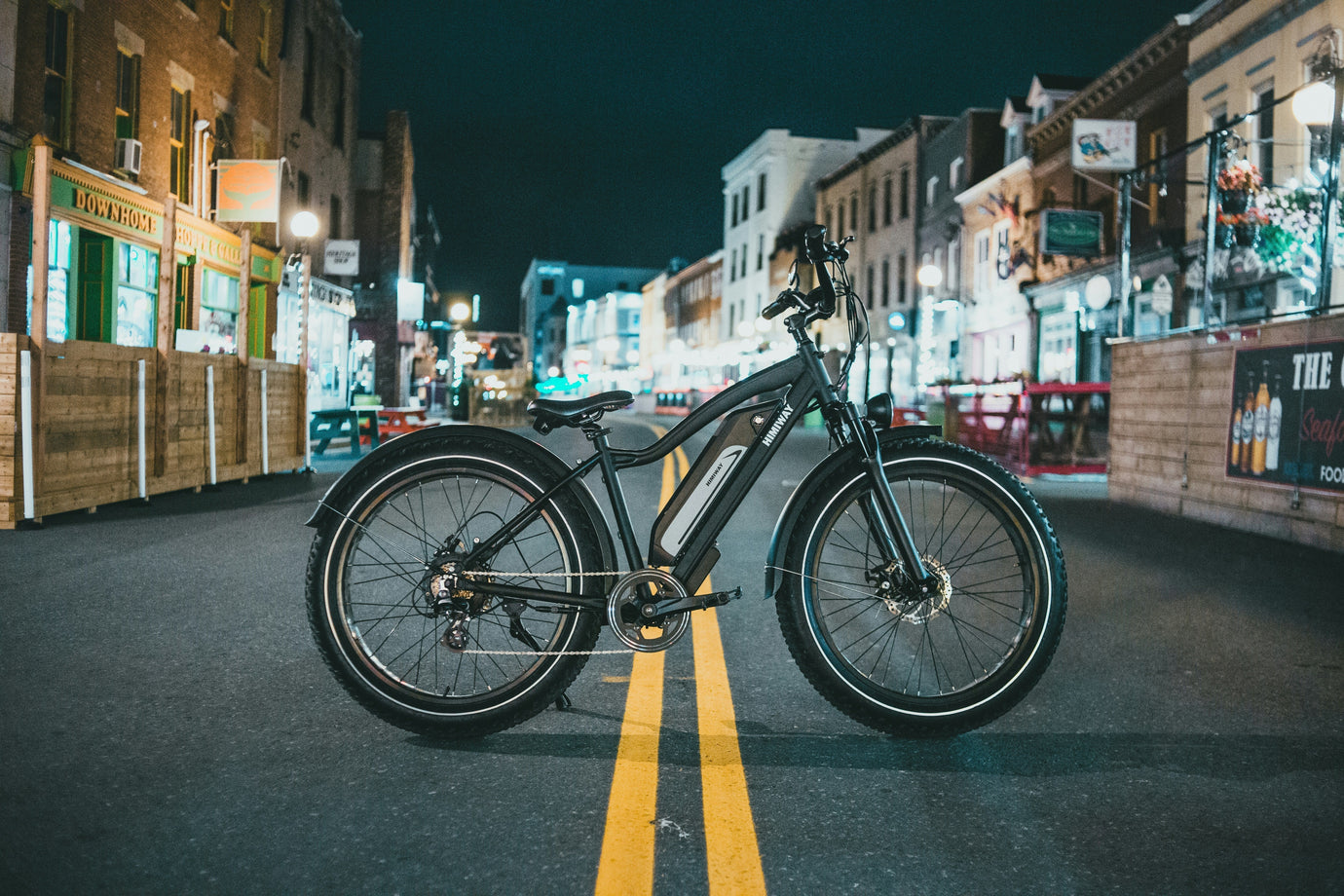 Used electric bike for sale in the UK at night — MyNextBike.co.uk marketplace for e-bikes