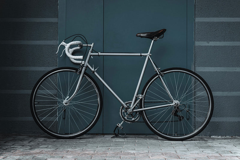Clean used bike in front of garage prepared to be photographed to sell on UK marketplace