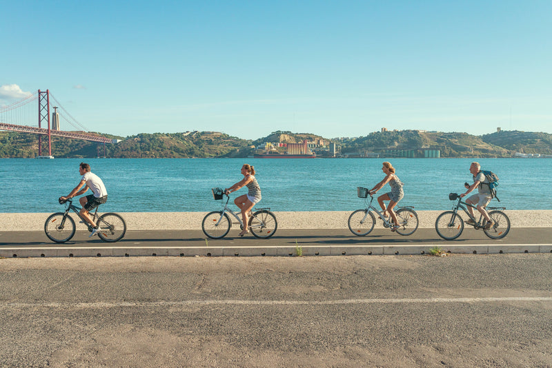 People riding affordable second-hand bikes outdoors, ideal for buyers exploring the used bike market.
