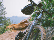 Used mountain bike on an off-road trail, showing front suspension, wide tyres, and trail-ready setup – find your perfect mountain bike on MyNextBike. 