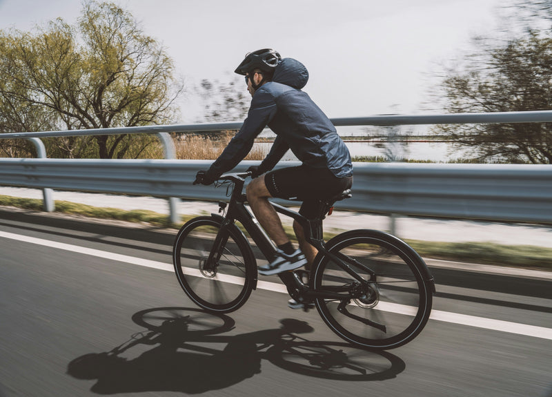 Rider on a road bike out on a training ride — guide to buying a used road bike in the UK.