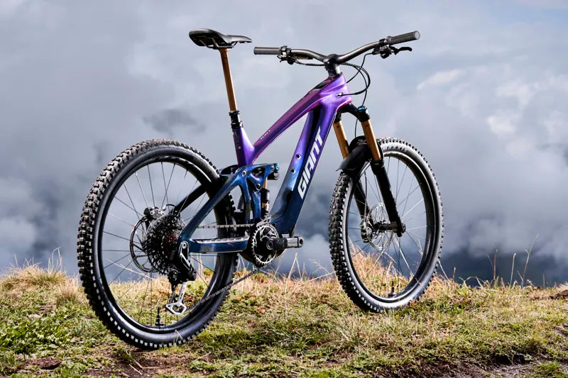 Giant Reign Advanced E+ 0 Electric Mountain Bike in Purple Haze/Metallic Navy 2026