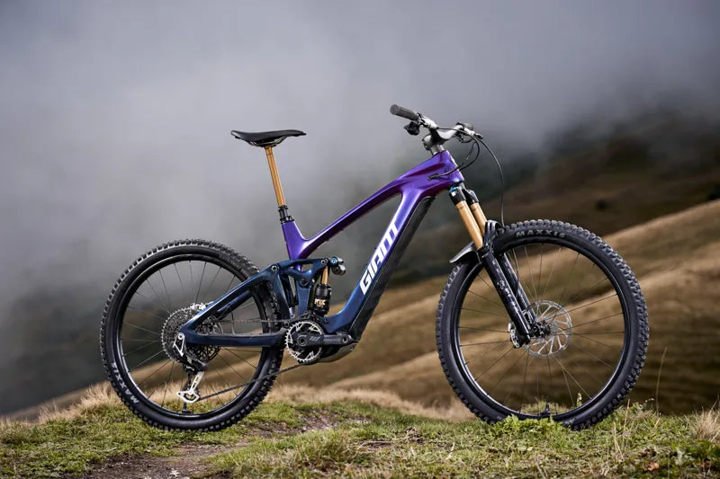 Giant Reign Advanced E+ 0 Electric Mountain Bike in Purple Haze/Metallic Navy 2026