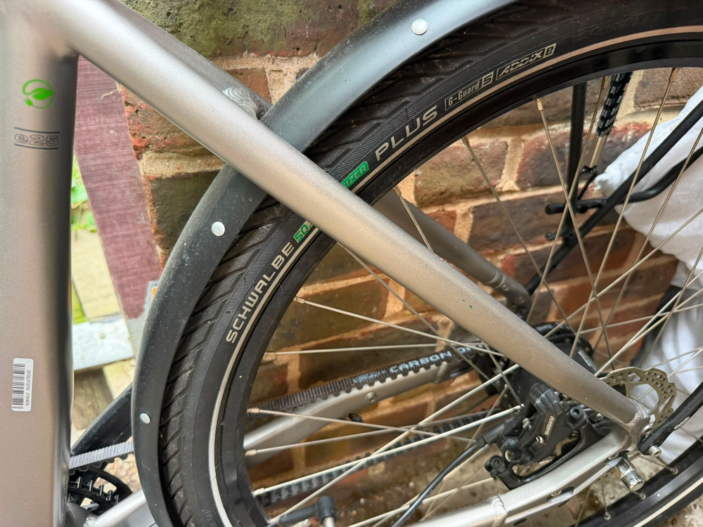 Unibike Unibike Shimano STEPS E-City Bike 28in 250W Mid-Drive Disc Brakes Grey Rack 2023