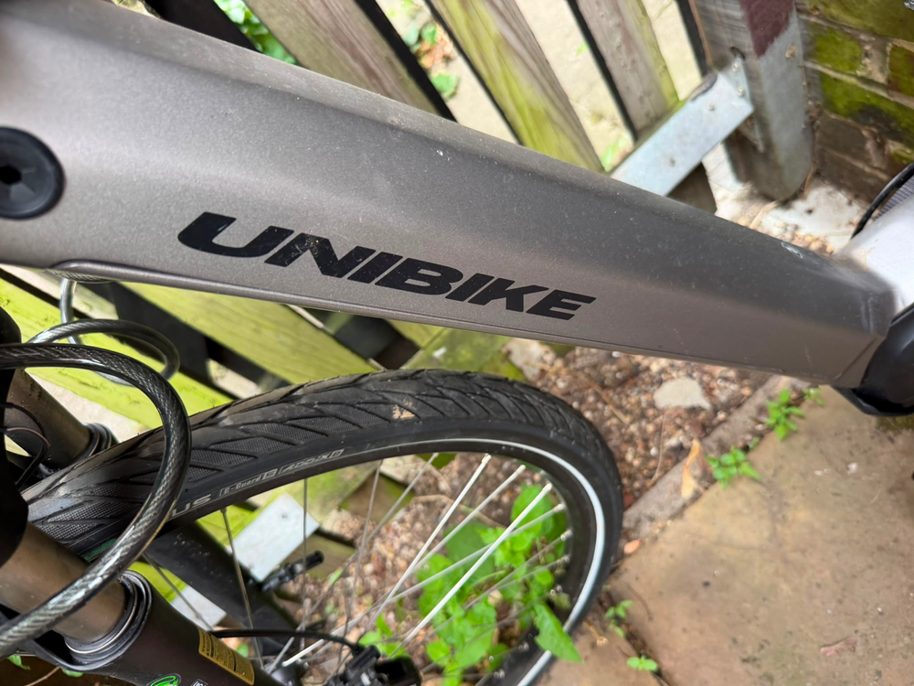 Unibike Unibike Shimano STEPS E-City Bike 28in 250W Mid-Drive Disc Brakes Grey Rack 2023