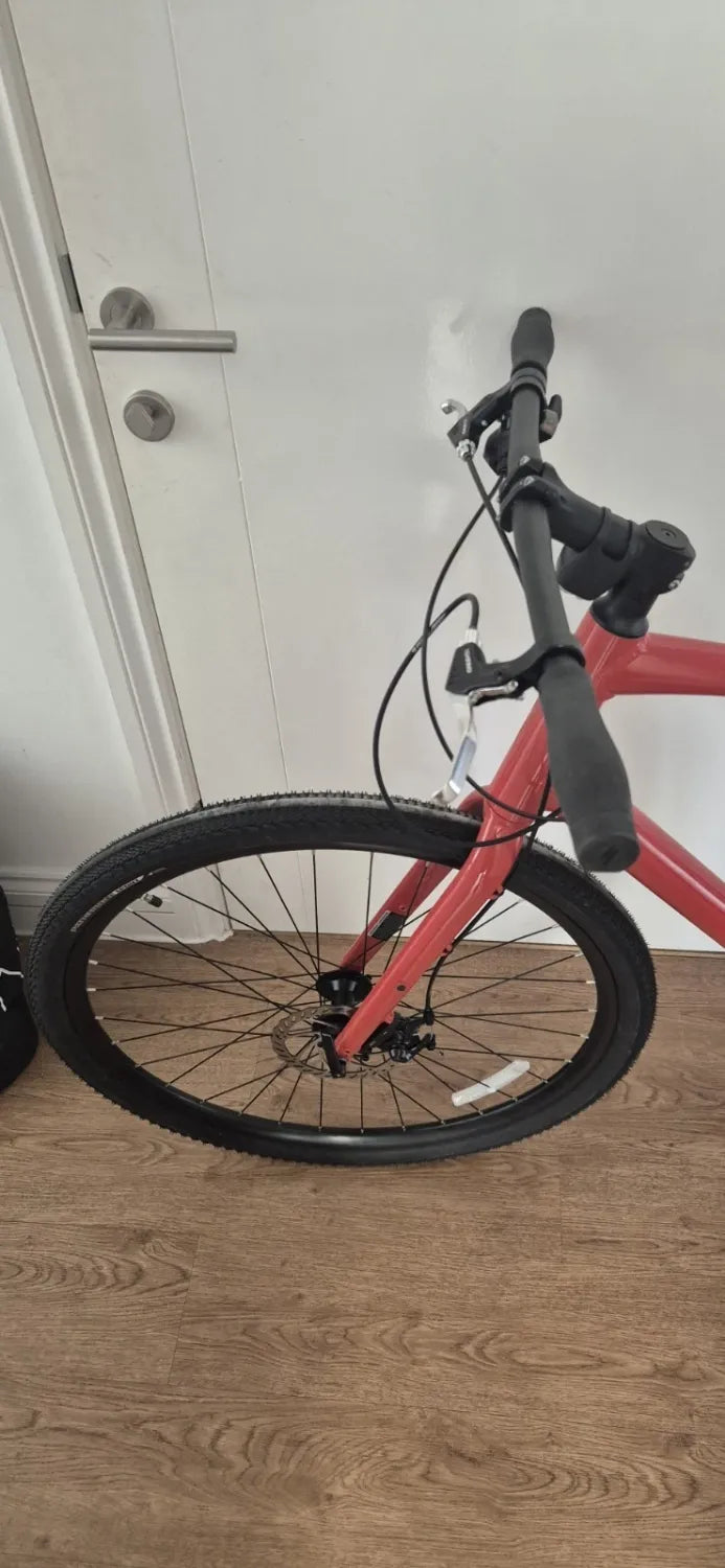 Specialized 	 Specialized Sirrus X 1.0 2025 Hybrid Bike Gloss Deep Orange / Redwood Reflective
